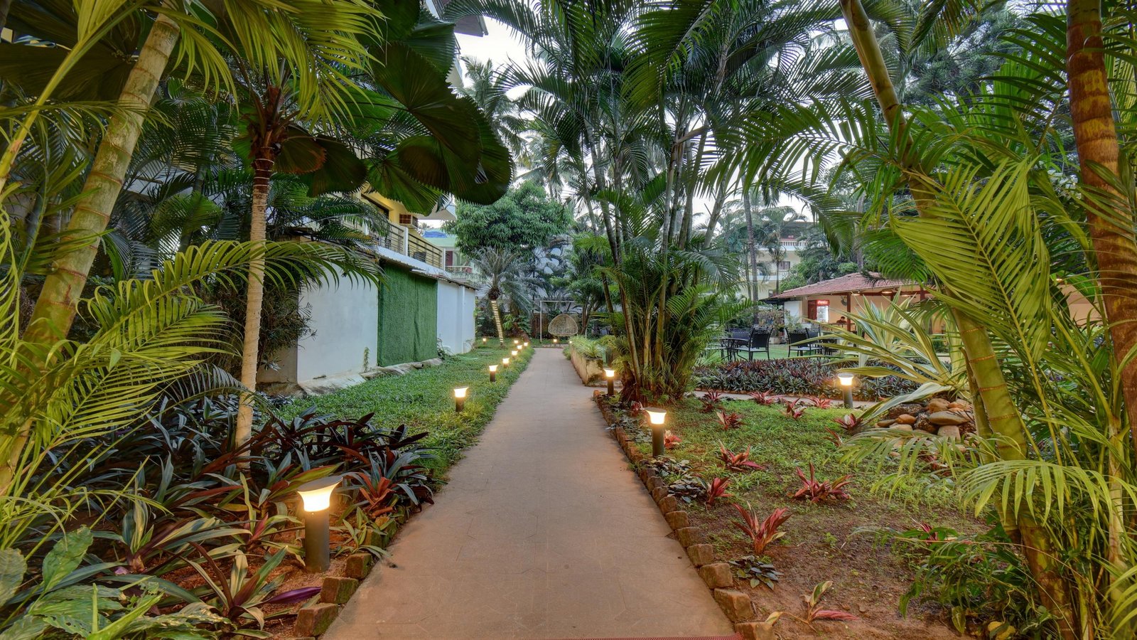 Resort building surrounded by tropical gardens